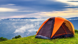 A orange color tent in a beautiful nature: Best Gifts for Men