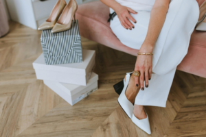 Woman in White Dress Shirt and Gold Ring 