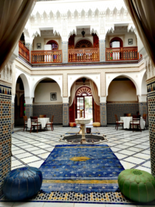 Elegant Moroccan Interior Courtyard with Luxurious rugs