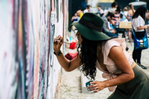 Woman Painting on Wall