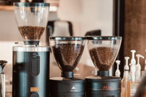 Roasted Coffee Beans in a Coffee Grinder Machine