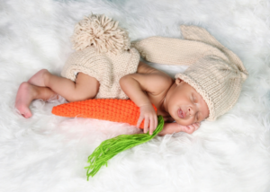 Little Baby Sleeping with Wool Carrot