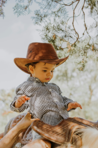 Adorable Baby in Cowboy Hat