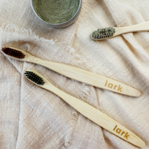 Wooden Toothbrushes on a Fabric