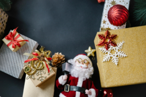 Colorful gift boxes and Santa Claus toy
