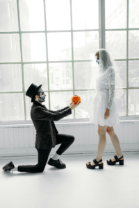 Man Offering A Pumpkin To A Woman