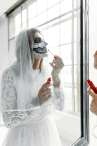 Woman in White Lace Long Sleeve Shirt With A Scary Face