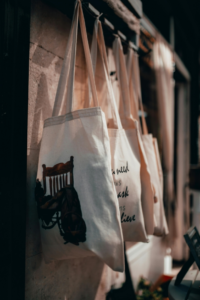 some white color monogrammed bags as DIY gifts for men