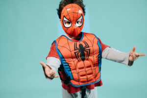 Boy Wearing a Red Spiderman Costume
