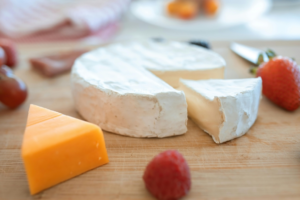 Sliced Cheese on Brown Wooden Table