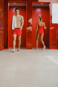 Swimmers Using the Shower Towel