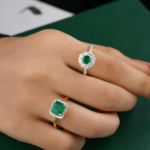 Silver and Diamond Ring on Persons Hand