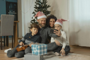 A Family Engaged in a Vide Call Using a Smartphone
