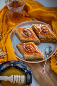 Three Chunks of Baklava on Plate with Tea Spoon
