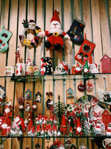 Santa Figurines on a Shelf
