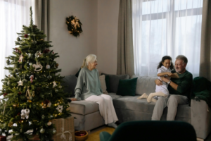 Woman in Gray Sweater Sitting on Gray Couch
