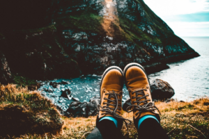 a man with his adventurous hiking boots