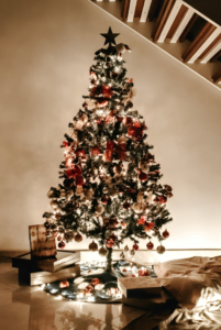 Christmas Tree With Decors Under the Staircase
