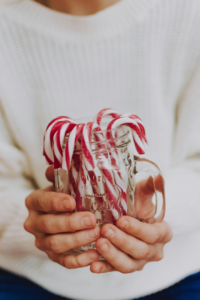 Person Holding Jar With Candies