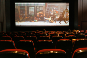 Cartoon Movie Showing on Theater Screen
