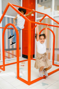 Kids Playing Together
In A Playhouse