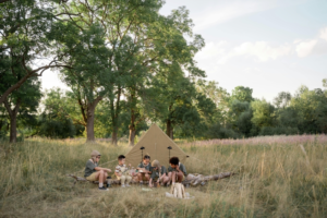 Children on a Camp by the Forest
