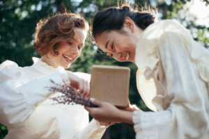 Smiling Women with Gift in Park